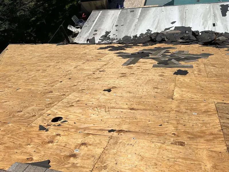 Roof tear-off before metal roof installation